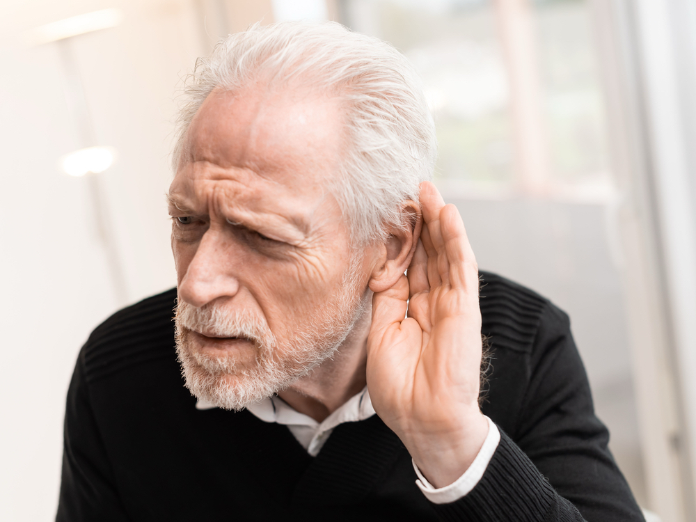Couple discussing the types of hearing loss with a hearing specialist at Contra Costa Hearing Aid Center in Walnut Creek, CA